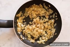Sweating minced onion on the pan
