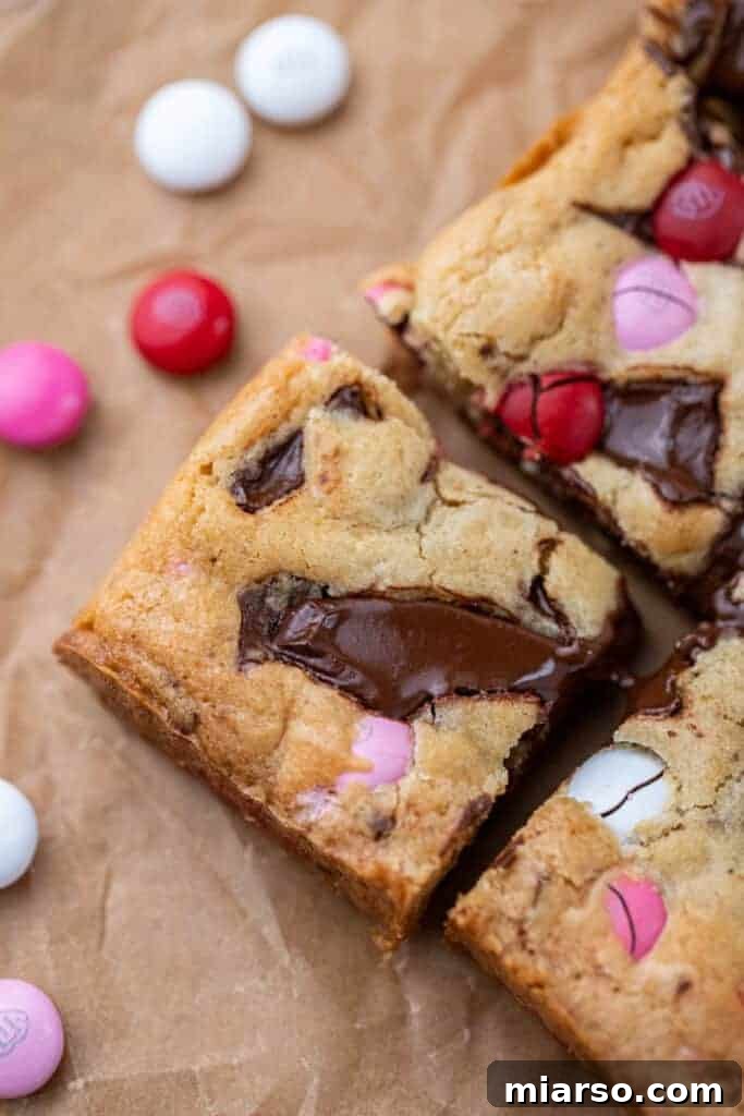 Close-up of festive Valentine's Day M&M's blondies with red, pink, and white candies