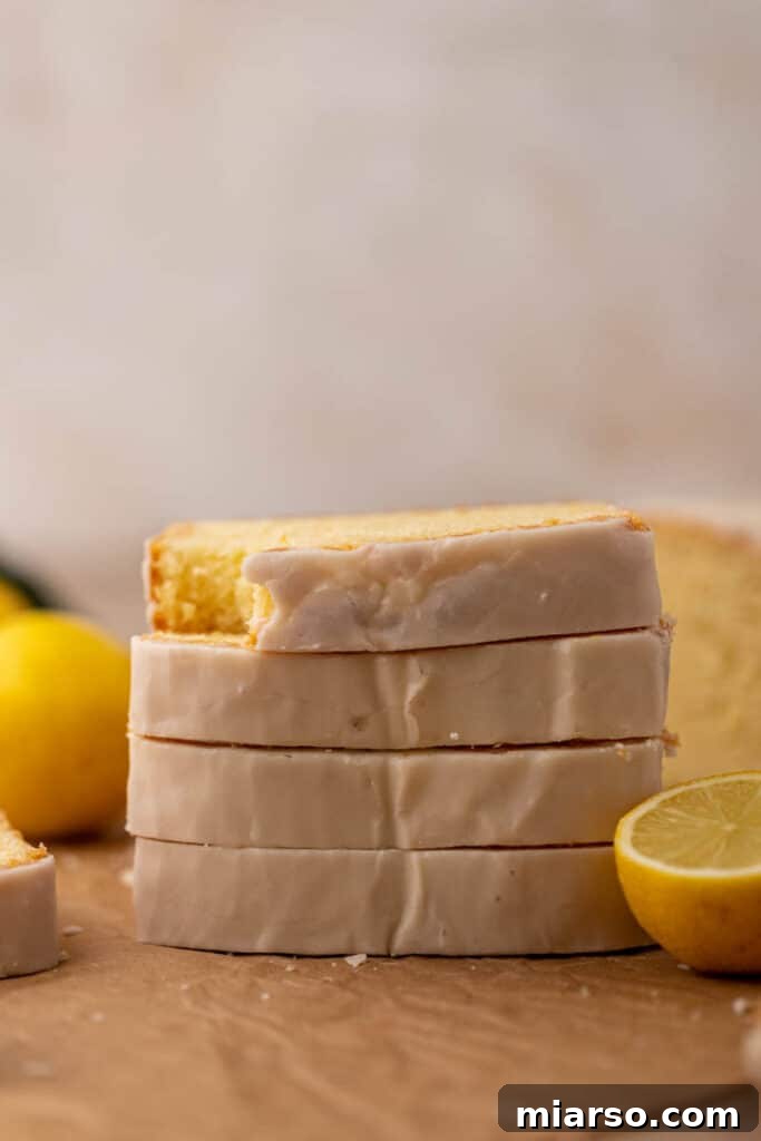 A full Starbucks lemon loaf, beautifully glazed and ready to slice.