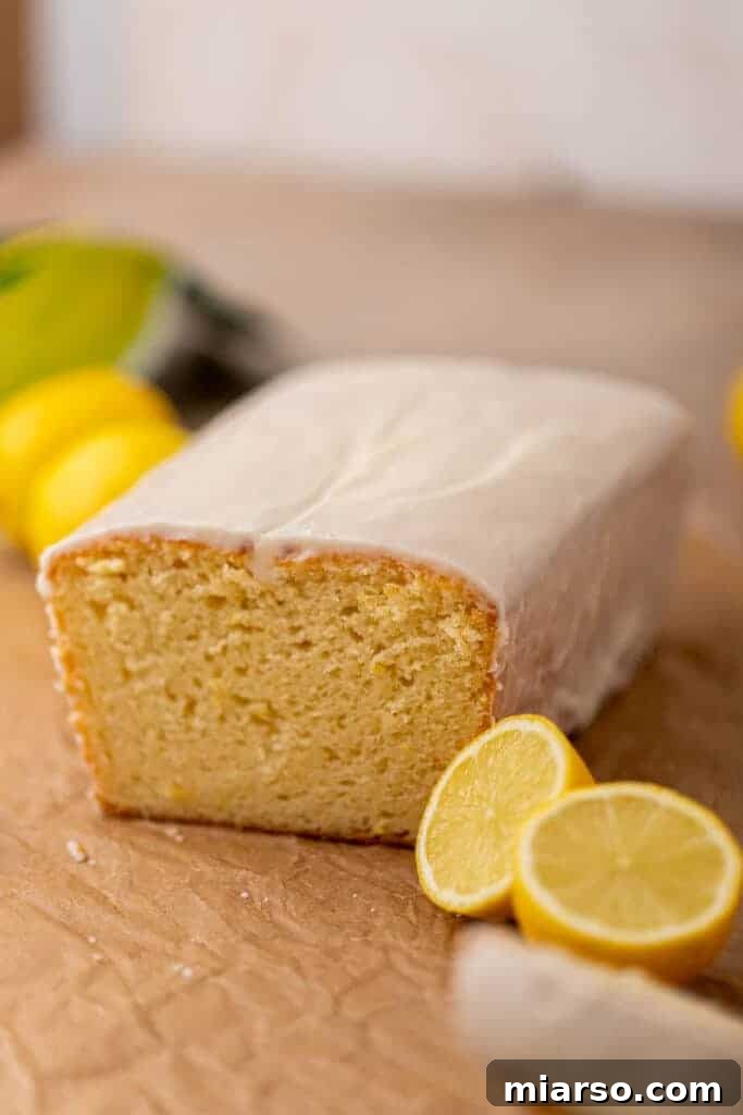 Close-up of a Starbucks lemon loaf with an incredibly thick and perfectly set glaze.