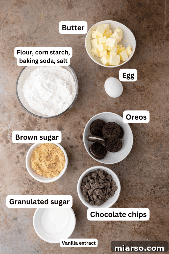 Oreo Stuffed Chocolate Chip Cookies Made Simple 4 Essential ingredients for baking delicious Oreo stuffed chocolate chip cookies laid out on a kitchen counter.