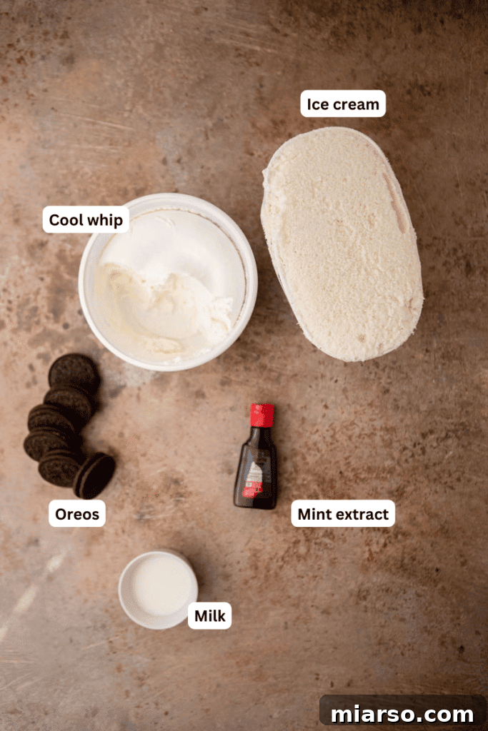 DIY McDonalds Shamrock Oreo McFlurry 3 Ingredients for Mcdonald's Shamrock Oreo McFlurry arranged on a surface