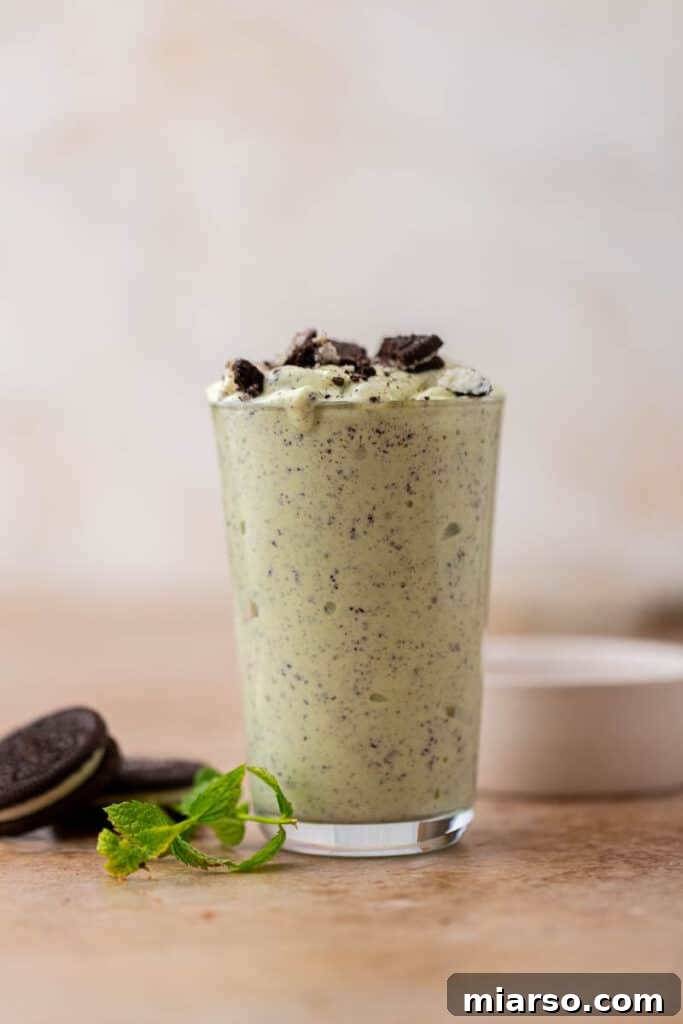 DIY McDonalds Shamrock Oreo McFlurry 8 Shamrock Oreo McFlurry in a clear glass with a spoon