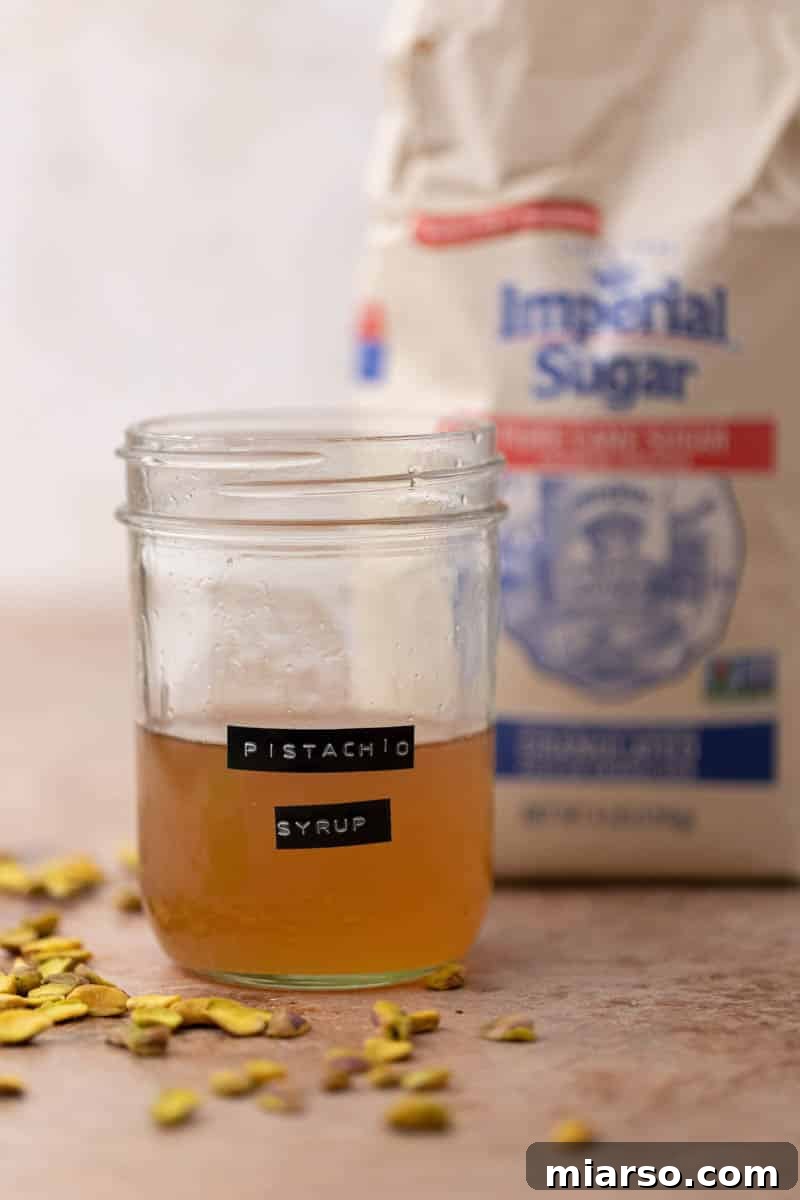 Starbucks Pistachio Syrup: Your Coffee's Delicious Upgrade 7 Finished Starbucks-style pistachio syrup in a glass bottle, ready to be used with coffee