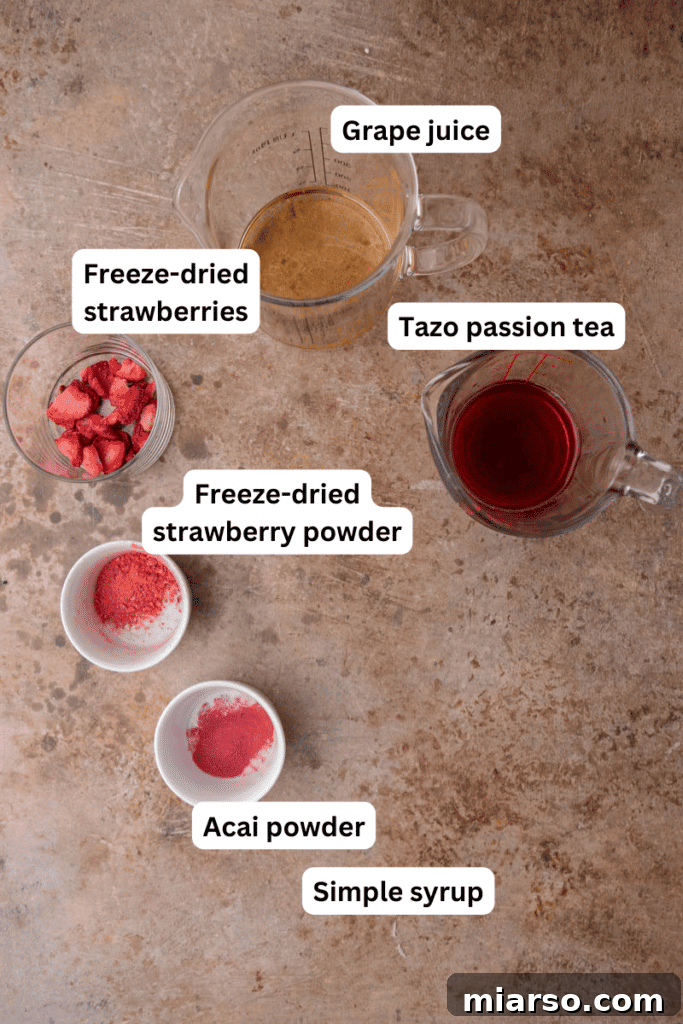 Craft Your Own Starbucks Strawberry Acai Refresher 3 Fresh ingredients laid out on a kitchen counter for making the drink