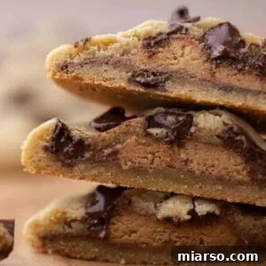 Quick Reese Peanut Butter Cup Chocolate Chip Cookies 12 Close up of peanut butter cup stuffed chocolate chip cookies