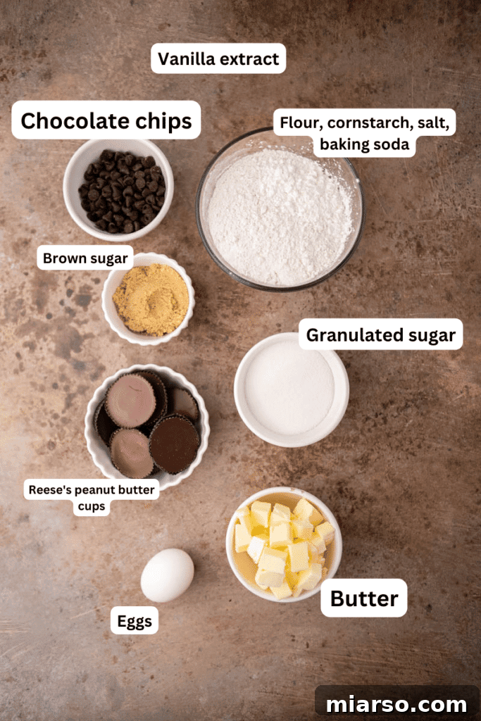 Quick Reese Peanut Butter Cup Chocolate Chip Cookies 3 Assortment of baking ingredients including butter, sugars, eggs, flour, and chocolate chips laid out on a kitchen counter.