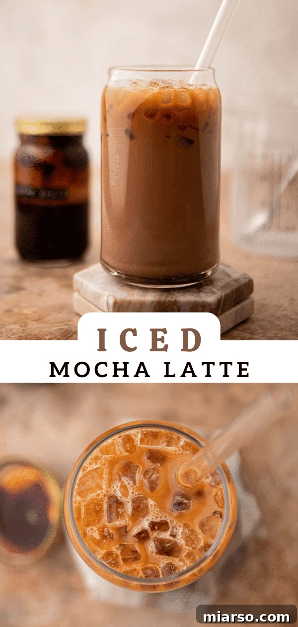 Close-up of an iced mocha latte, showcasing the rich chocolate color and creamy texture.