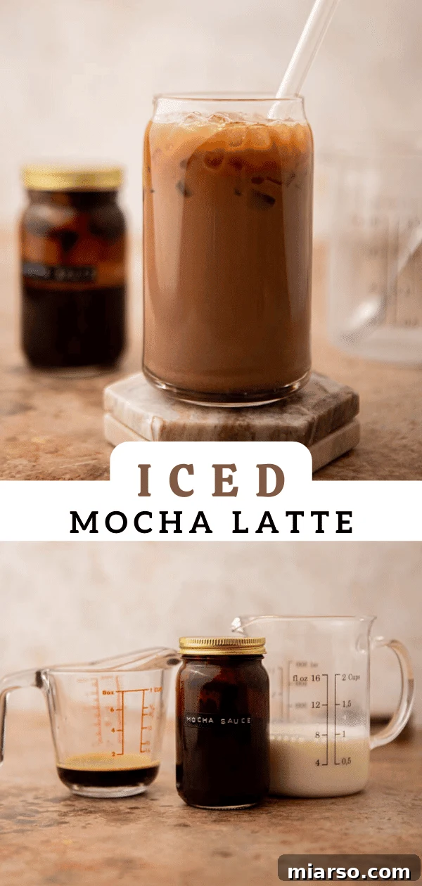 A refreshing glass of iced mocha latte on a light background, perfect for a summer drink.