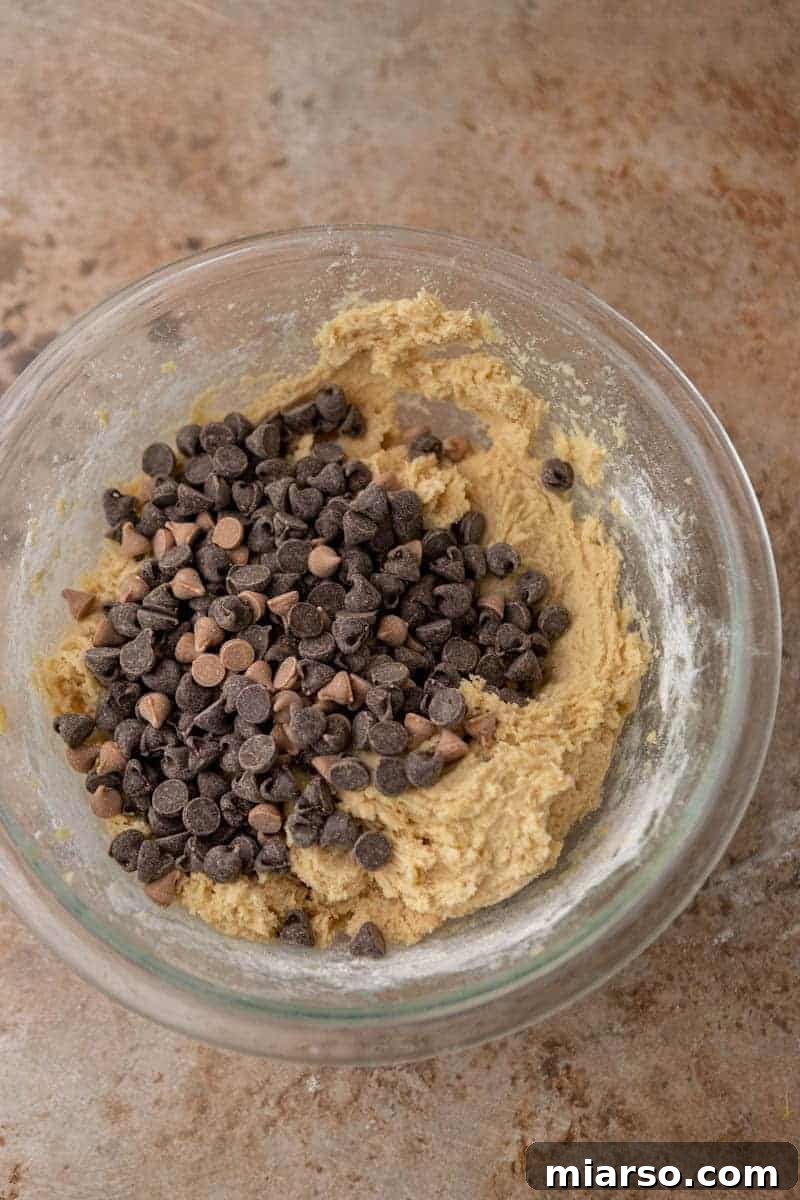 Gooey Skillet Chocolate Chip Pizookie 5 Cookie dough mixture in a bowl, showcasing the creamy texture before chocolate chips are added.