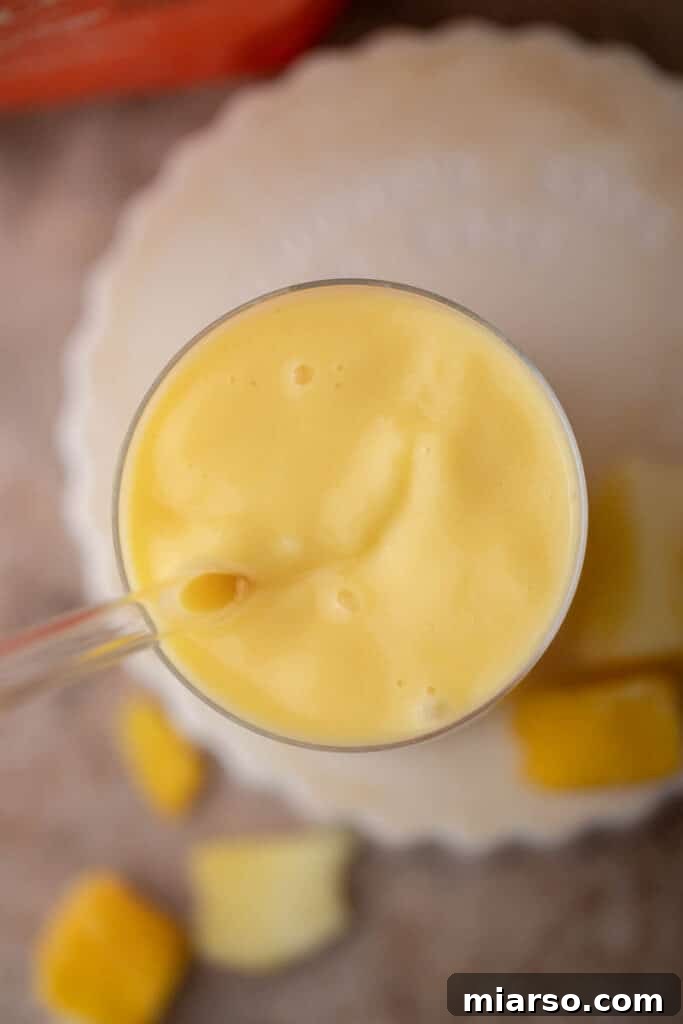 Overhead shot of Mcdonald's mango pineapple smoothie 