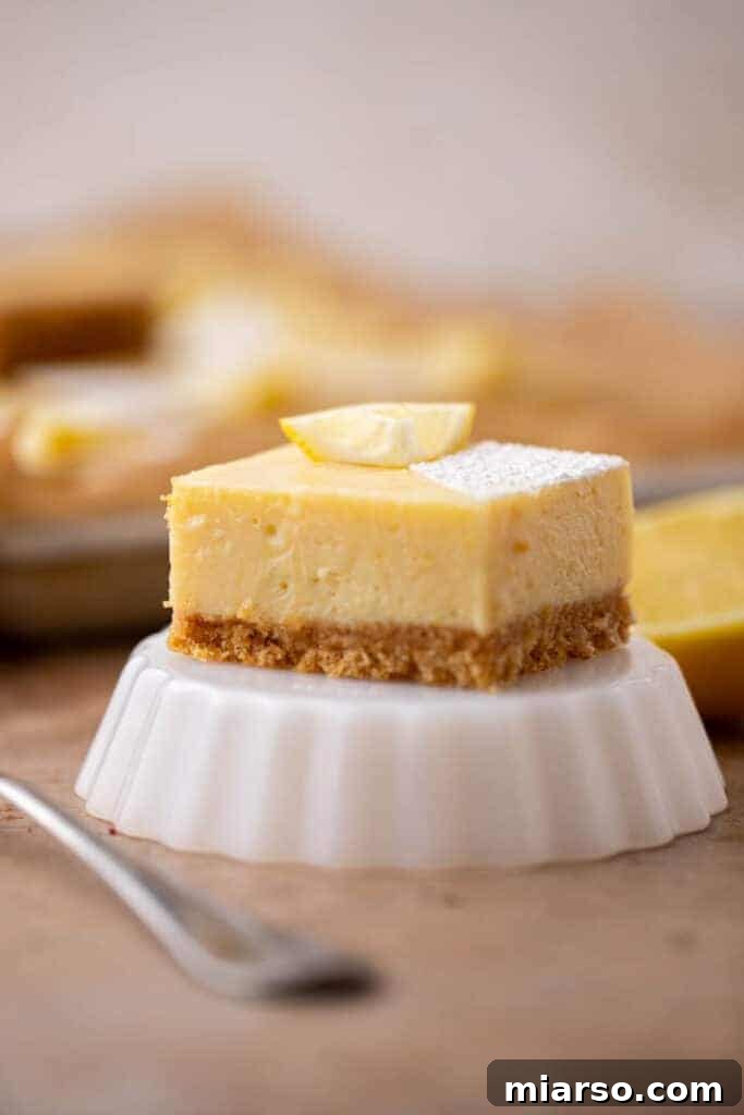Creamy lemon bars, perfectly set and ready to eat