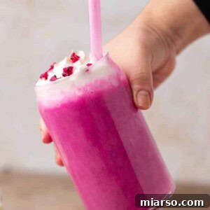 Hand holding starbucks barbie frappuccino