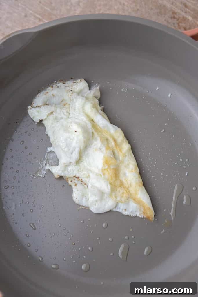 Egg whites cooked in a pan for the wrap