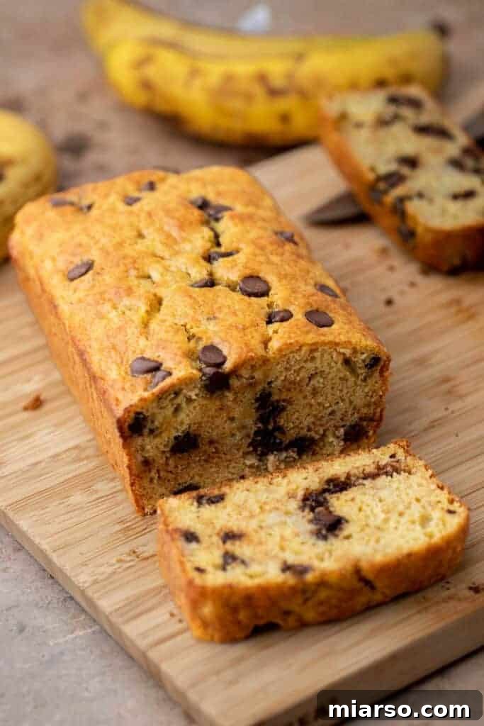 Close-up of baked cake mix banana bread with chocolate chips, showcasing its appealing texture