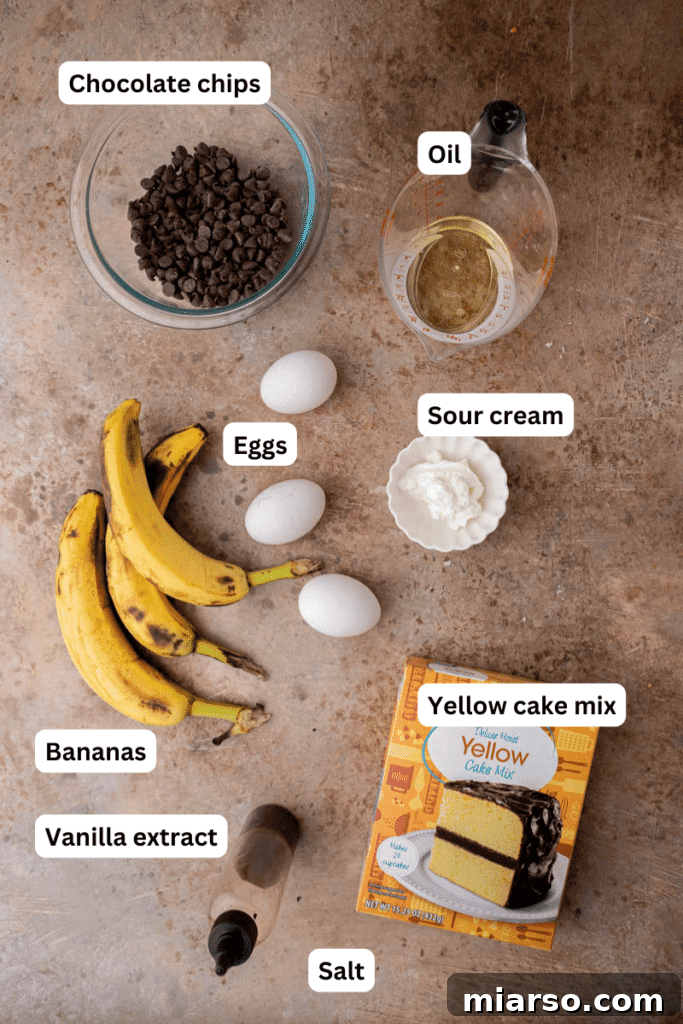 Fresh ingredients laid out on a kitchen counter, ready for making cake mix banana bread