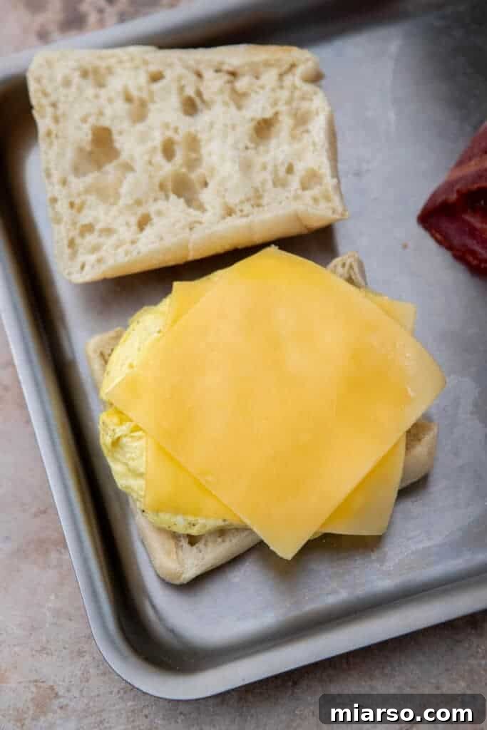 Starbucks Bacon Gouda: The Perfect Morning Indulgence 7 Breakfast sandwich on a pan