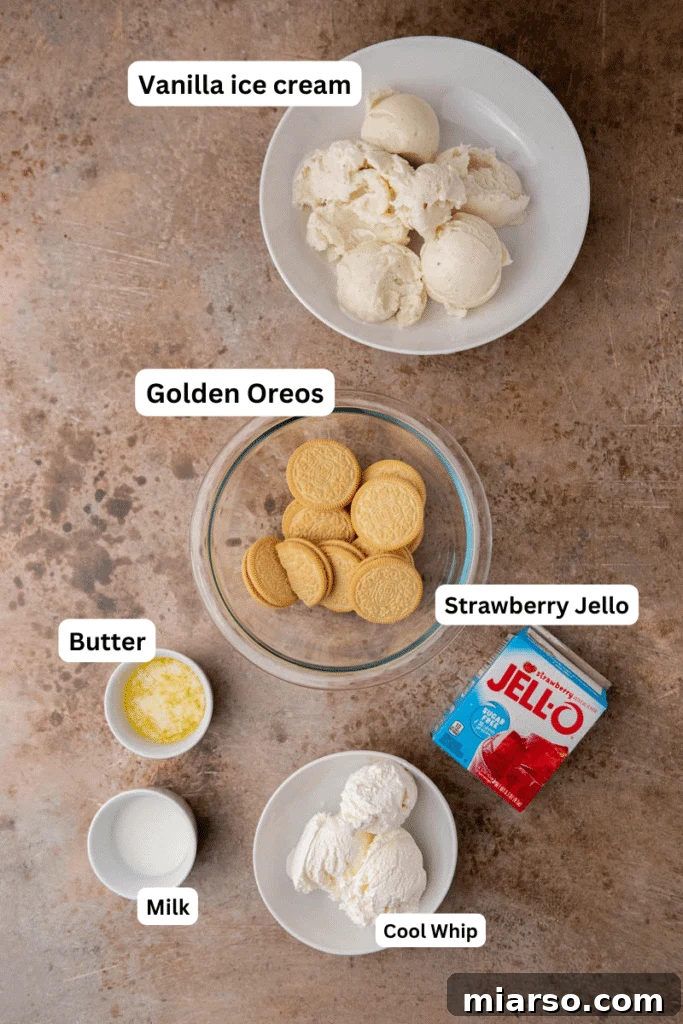 Heavenly Strawberry Shortcake McFlurry 3 A selection of ingredients for the homemade Strawberry Shortcake McFlurry on a kitchen counter, including golden Oreos, butter, strawberry jello, vanilla ice cream, cool whip, and milk.