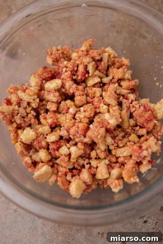 Heavenly Strawberry Shortcake McFlurry 6 Close-up of the strawberry shortcake crunch mixture in a bowl after mixing, showcasing its texture.