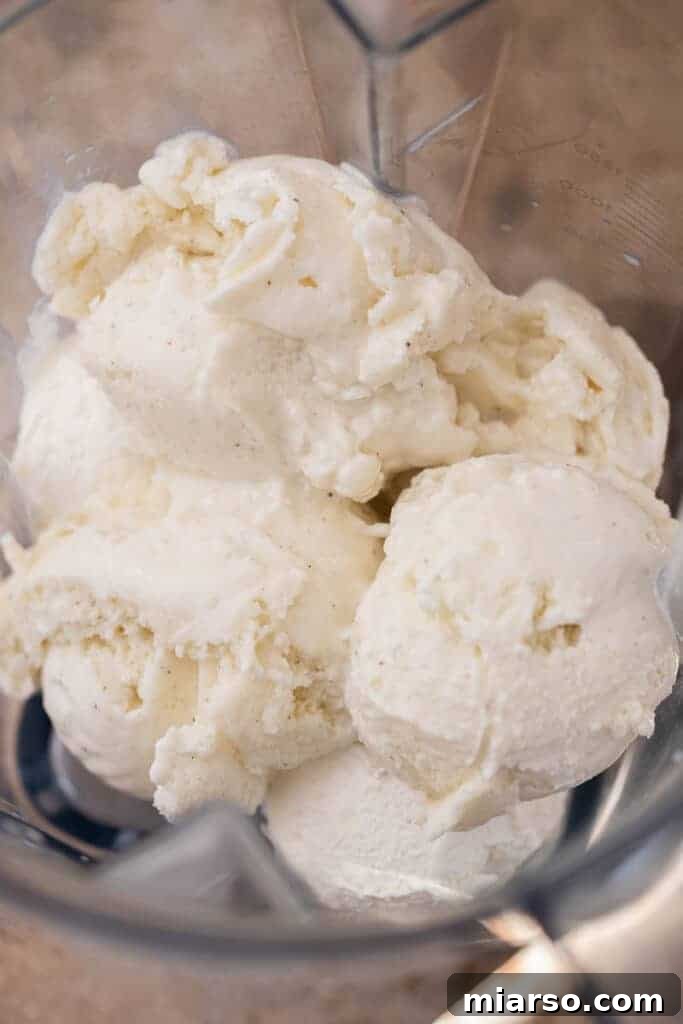 Heavenly Strawberry Shortcake McFlurry 8 Vanilla ice cream, cool whip, and milk in a blender, about to be mixed into creamy soft serve.