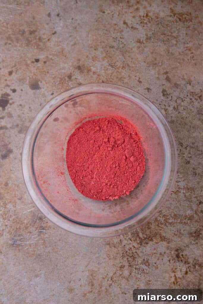 Close-up of freeze-dried strawberry powder, ready for mixing.