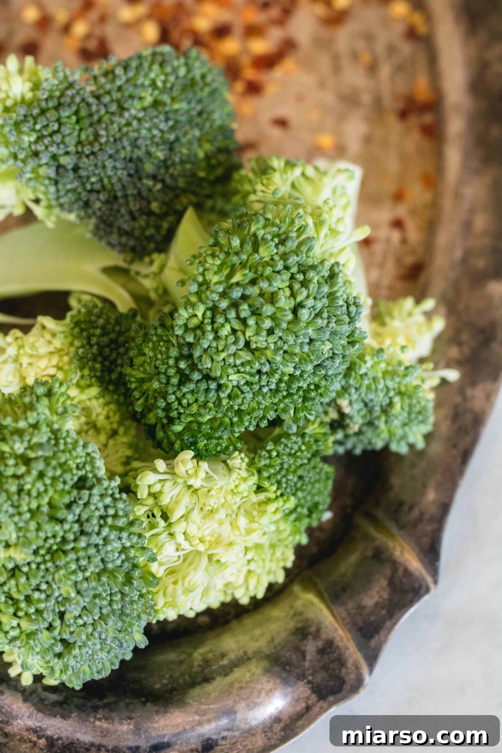 Air fryer broccoli recipe, showing fresh broccoli florets ready for prep