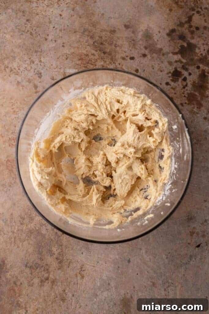 Star-Spangled Sugar Cookie Bars 6 Cookie dough in a bowl