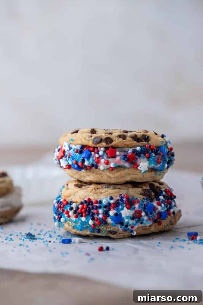 Stack of patriotic ice cream cookie sandwiches with red, white, and blue sprinkles