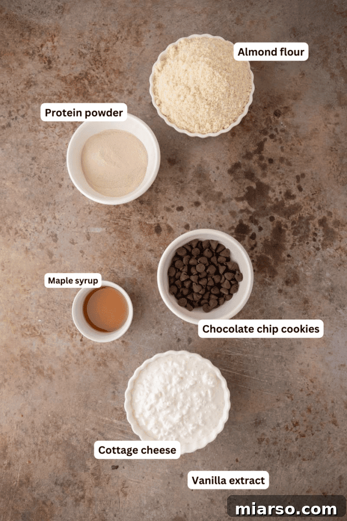 Various ingredients for the cottage cheese cookie dough laid out on a kitchen counter.