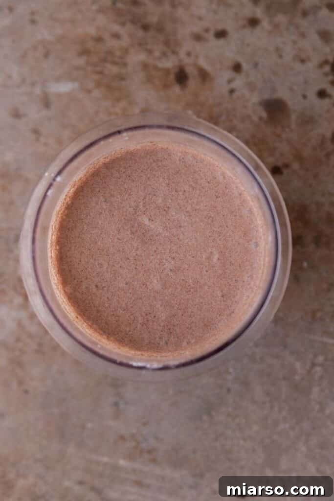 Decadent Ninja Creami Chocolate Ice Cream 5 Ninja Creami chocolate ice cream base in a cup