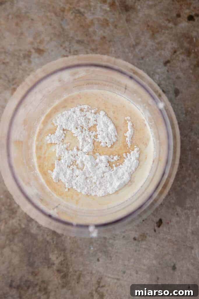 Ingredients being mixed in a bowl for Ninja Creami
