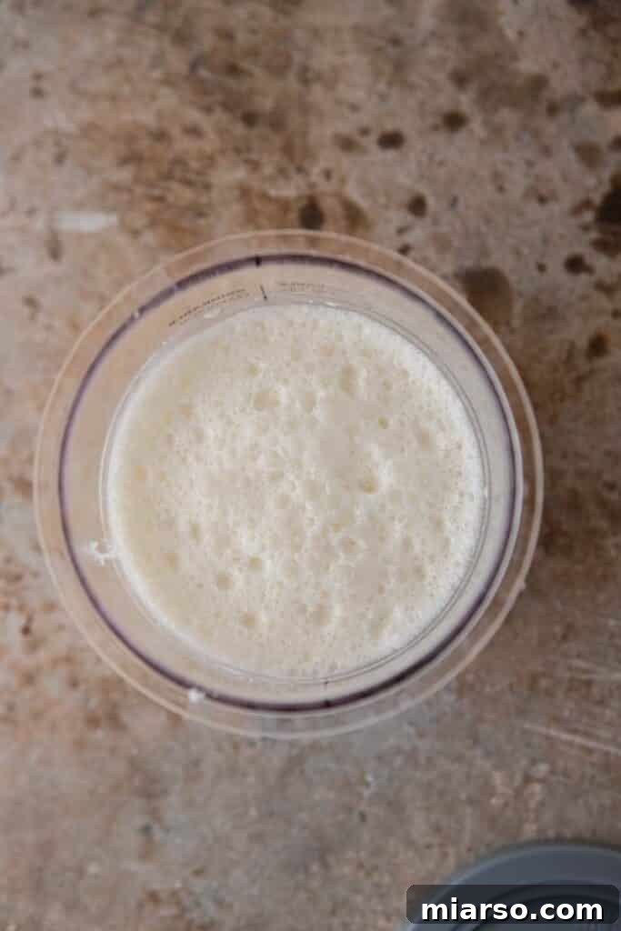 Frozen ice cream base in Ninja Creami pint