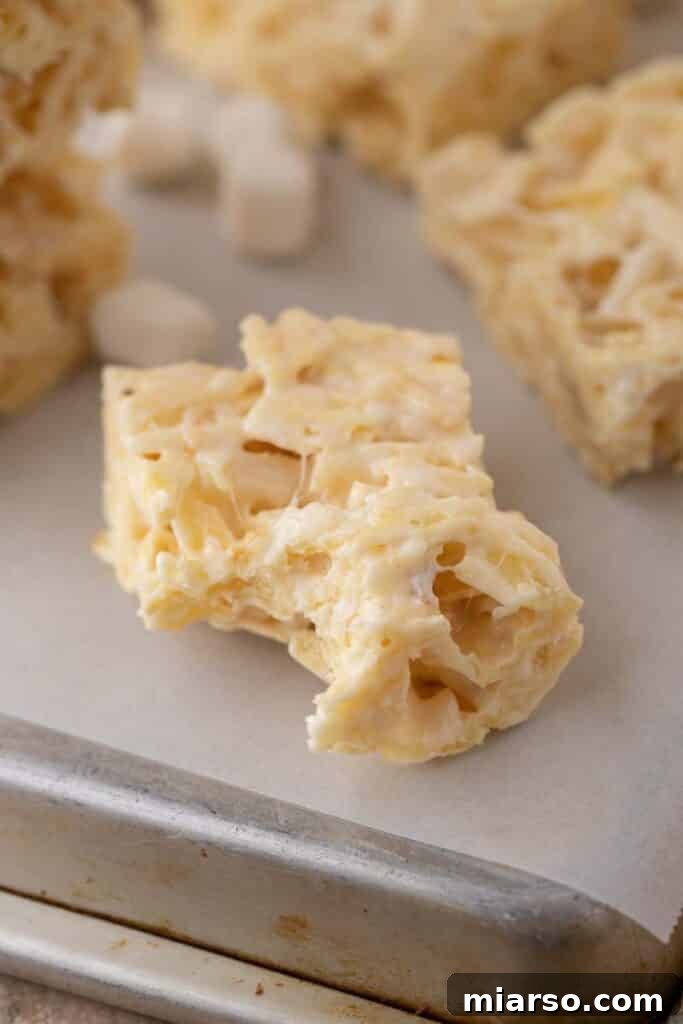 A Ruffles marshmallow treat with a bite taken out, showing its gooey texture