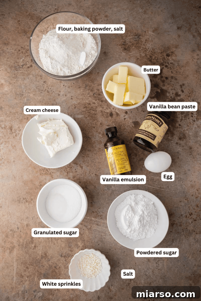 Carefully selected ingredients laid out on a kitchen counter, ready for baking Crumbl Nilla Bean Cupcake Cookies.