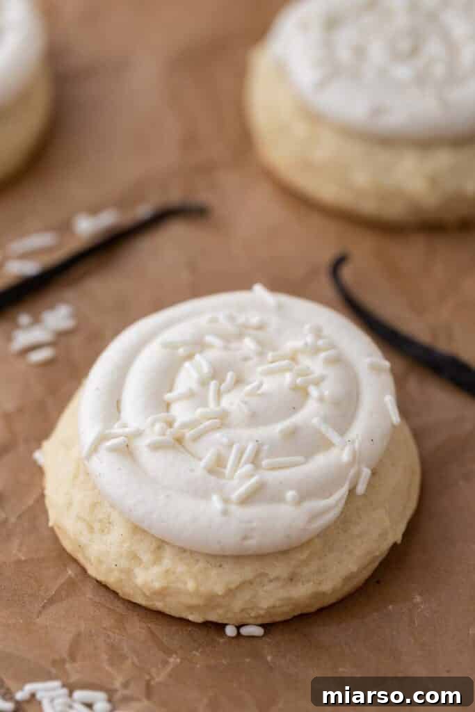 Finished Crumbl Nilla Bean Cupcake Cookies, perfectly frosted and sprinkled.