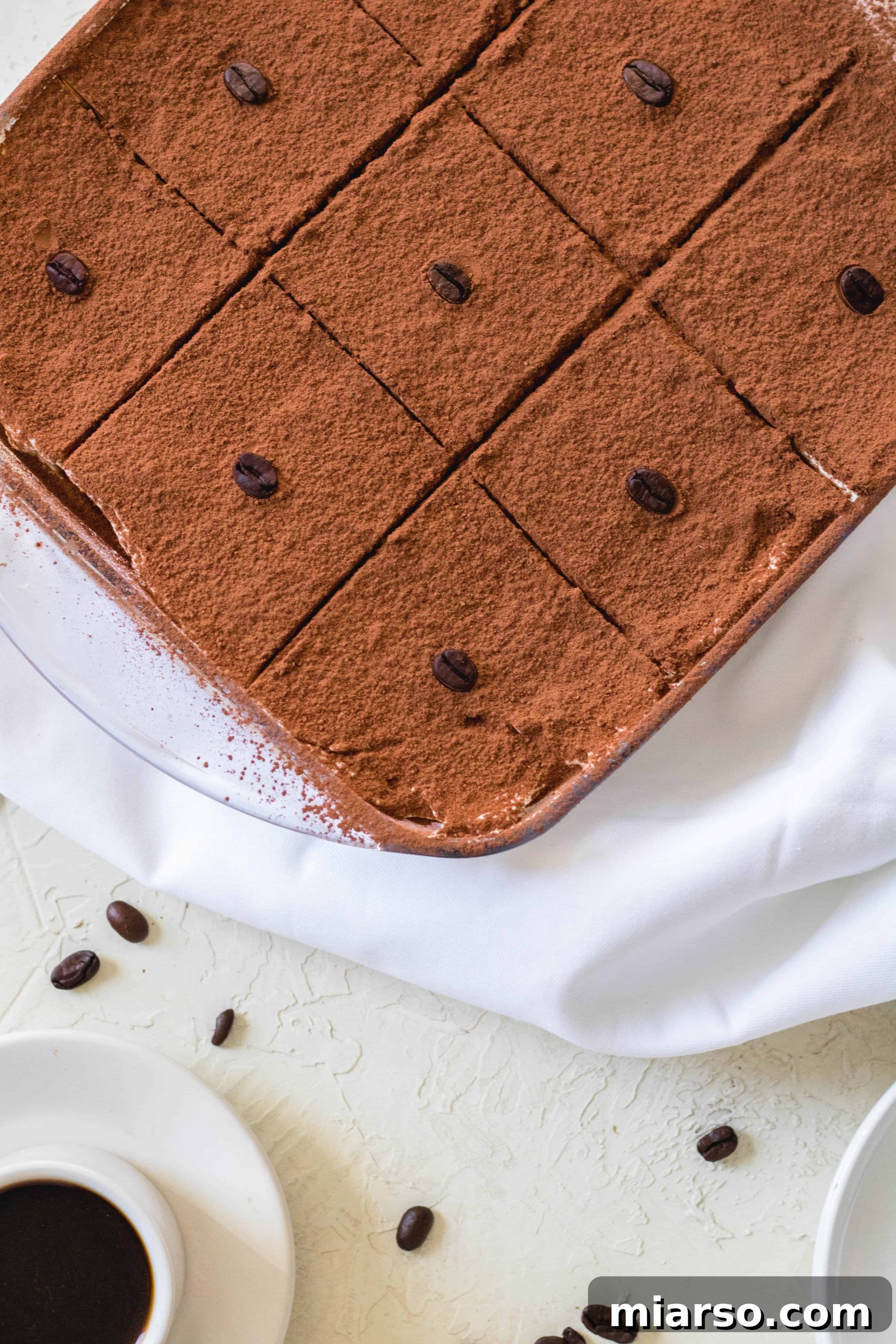 Effortless Tiramisu for the Indulgent 24 A slice of easy no-bake tiramisu showing its creamy layers