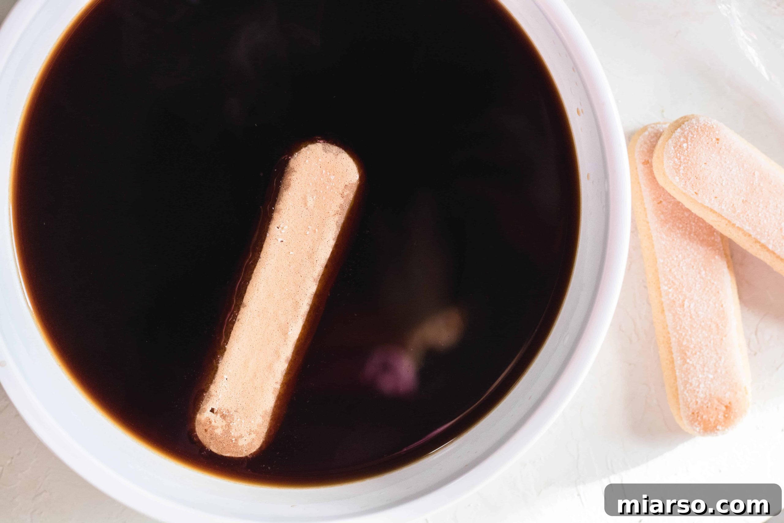 Effortless Tiramisu for the Indulgent 9 Dip lady infers in coffee