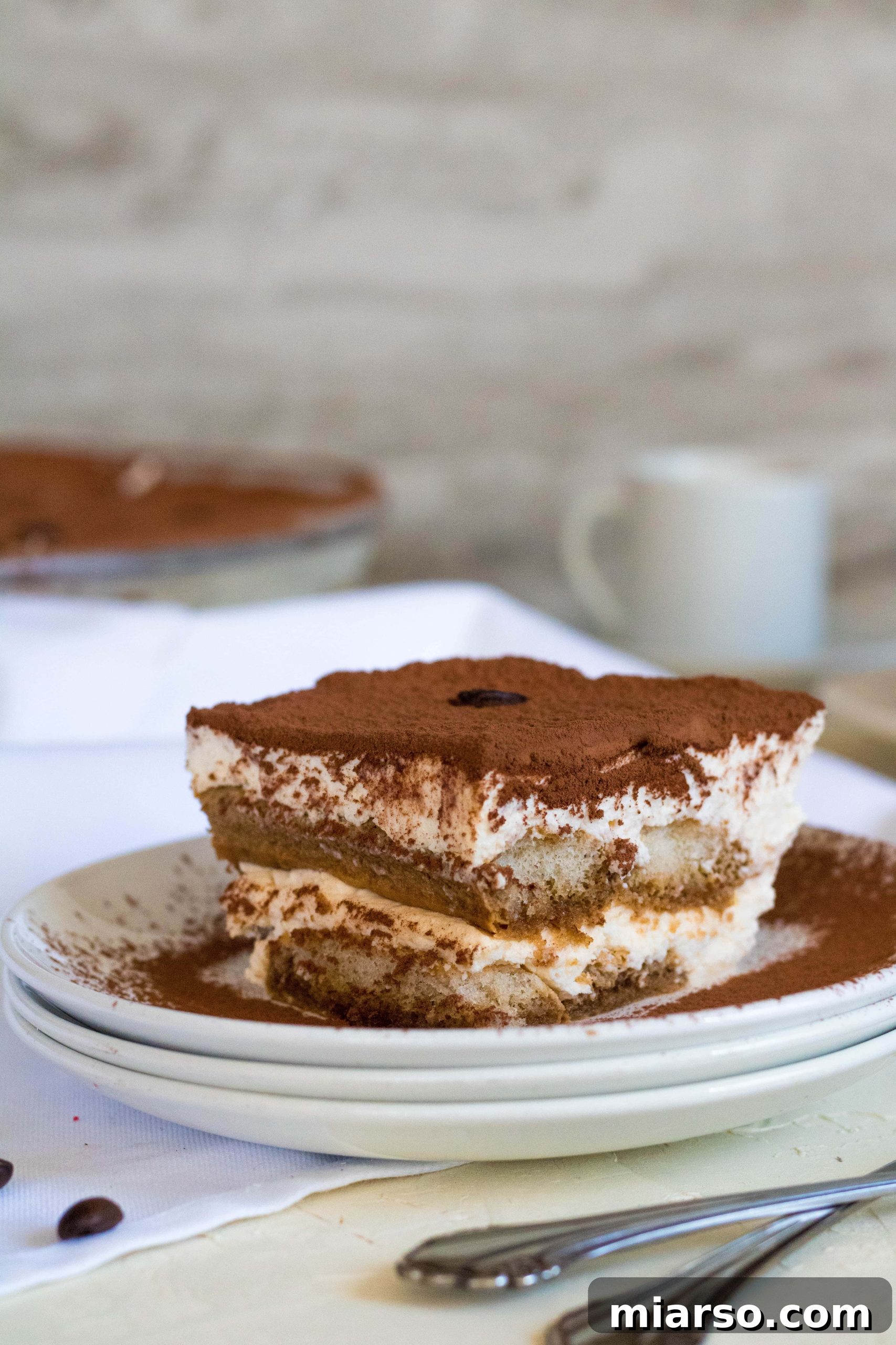 Effortless Tiramisu for the Indulgent 10 The finished layers of creamy tiramisu before dusting with cocoa