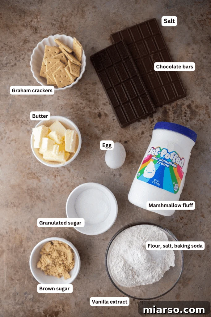 Various baking ingredients, including flour, sugar, eggs, butter, and graham crackers, laid out on a kitchen counter.
