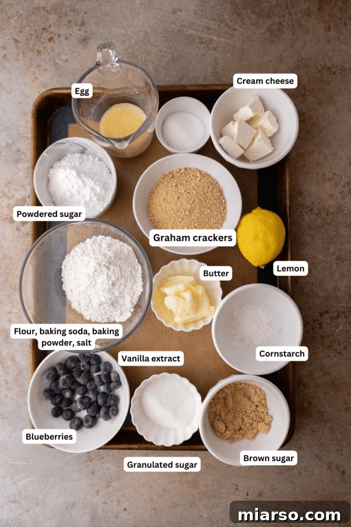 Ingredients for Crumbl blueberry cheesecake cookies laid out on a counter