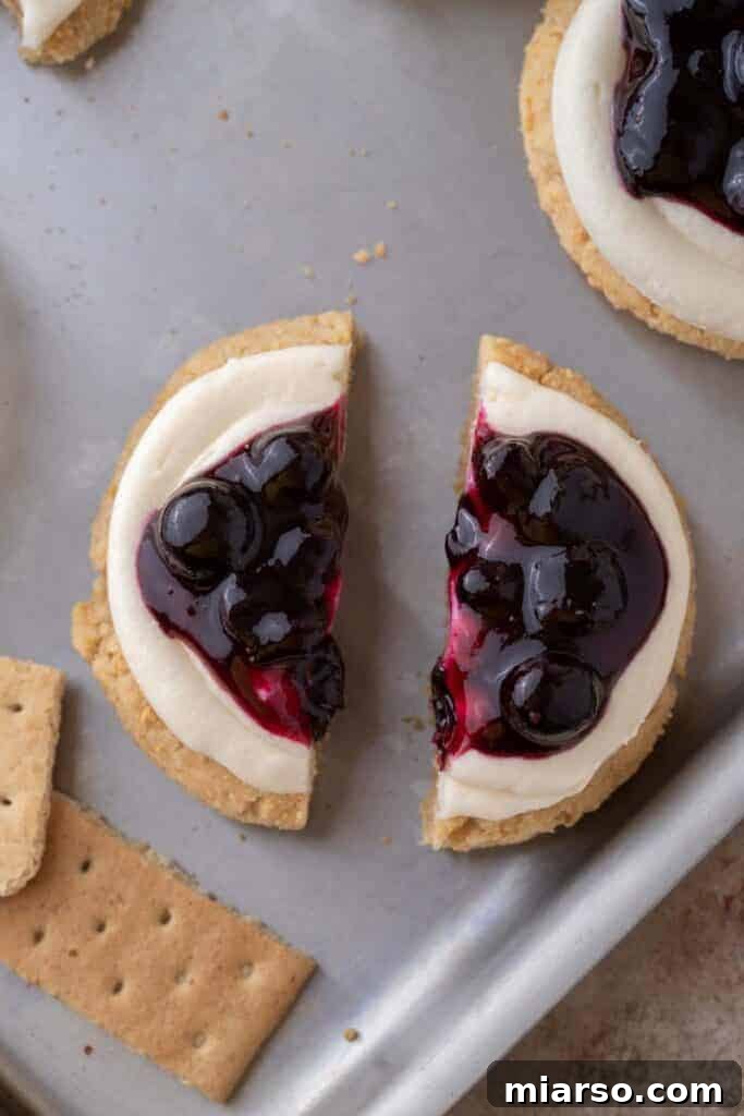 Tray of baked Crumbl blueberry cheesecake cookies