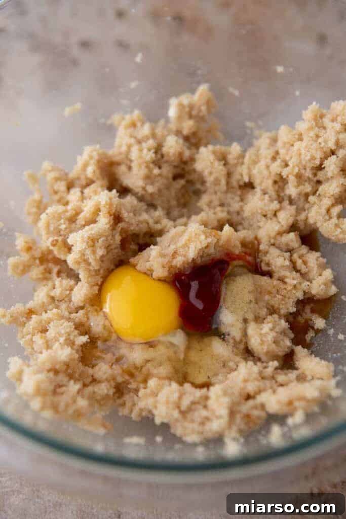 Creamed butter and sugar in a mixing bowl, light and fluffy.