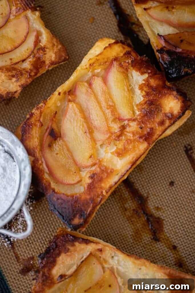 Close-up of baked TikTok tarte tatin, showing caramelized apples