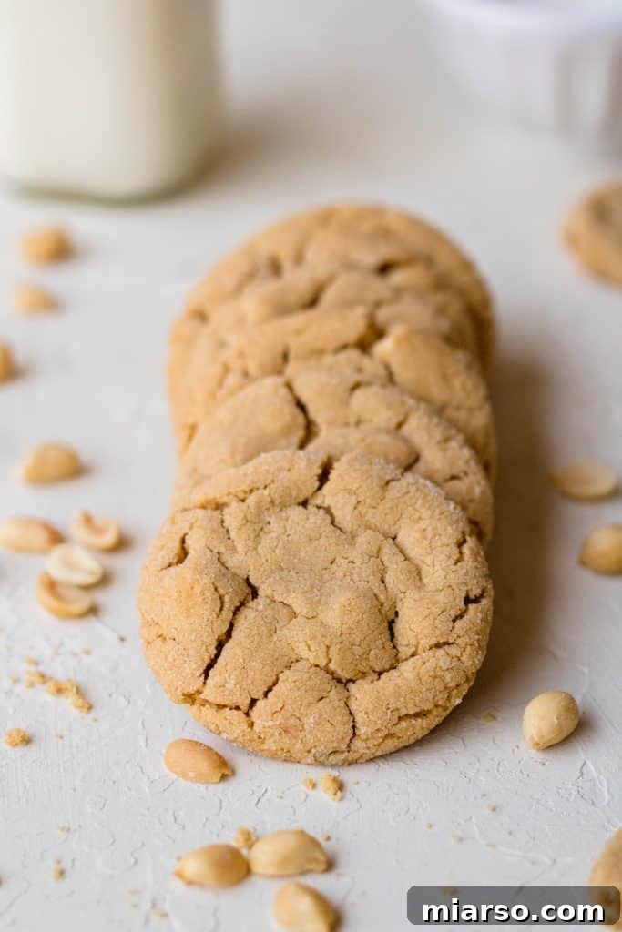 Chewy small batch peanut butter cookies with a fork mark on top.