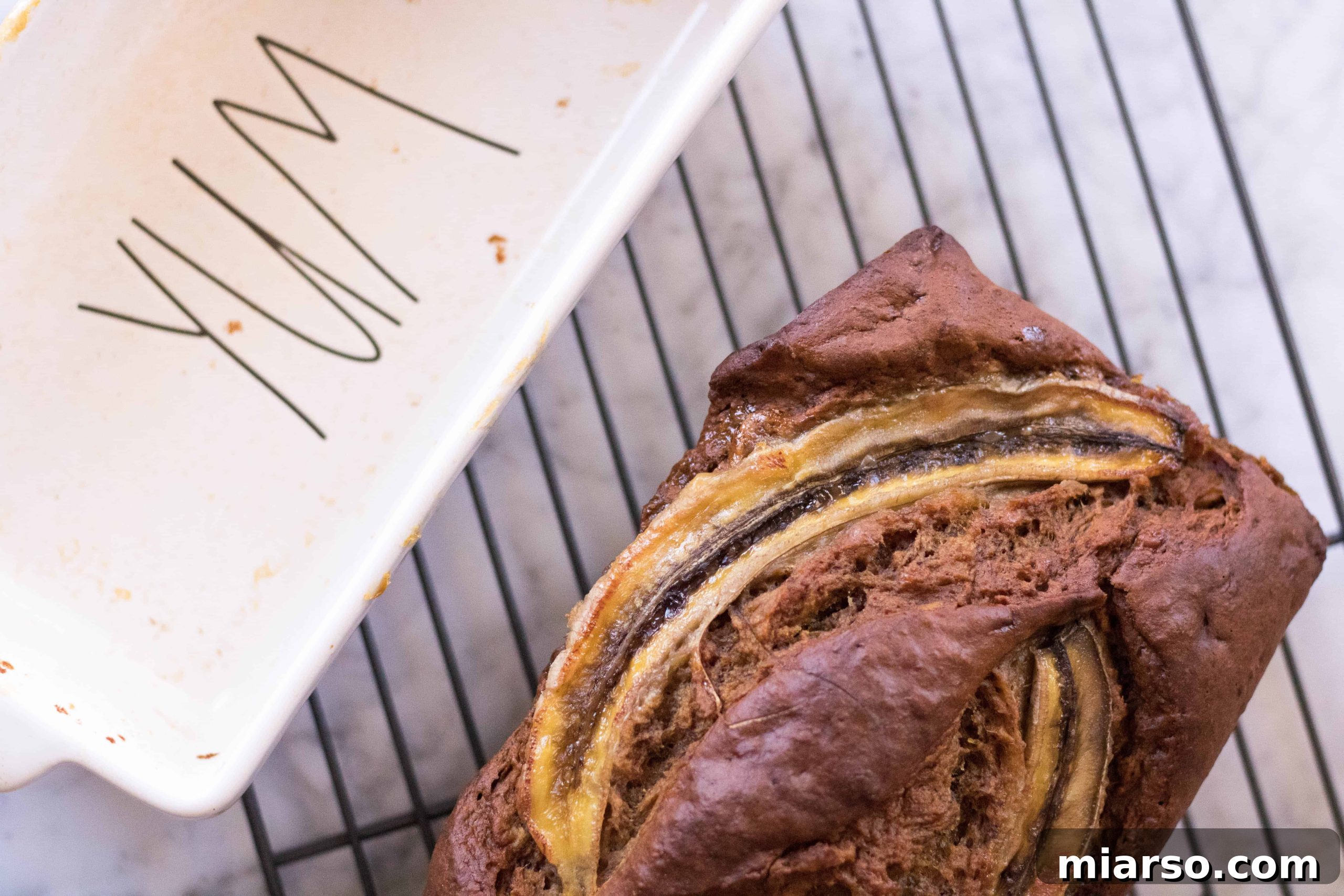 Close up of a slice of no sugar added banana bread, ready to be enjoyed