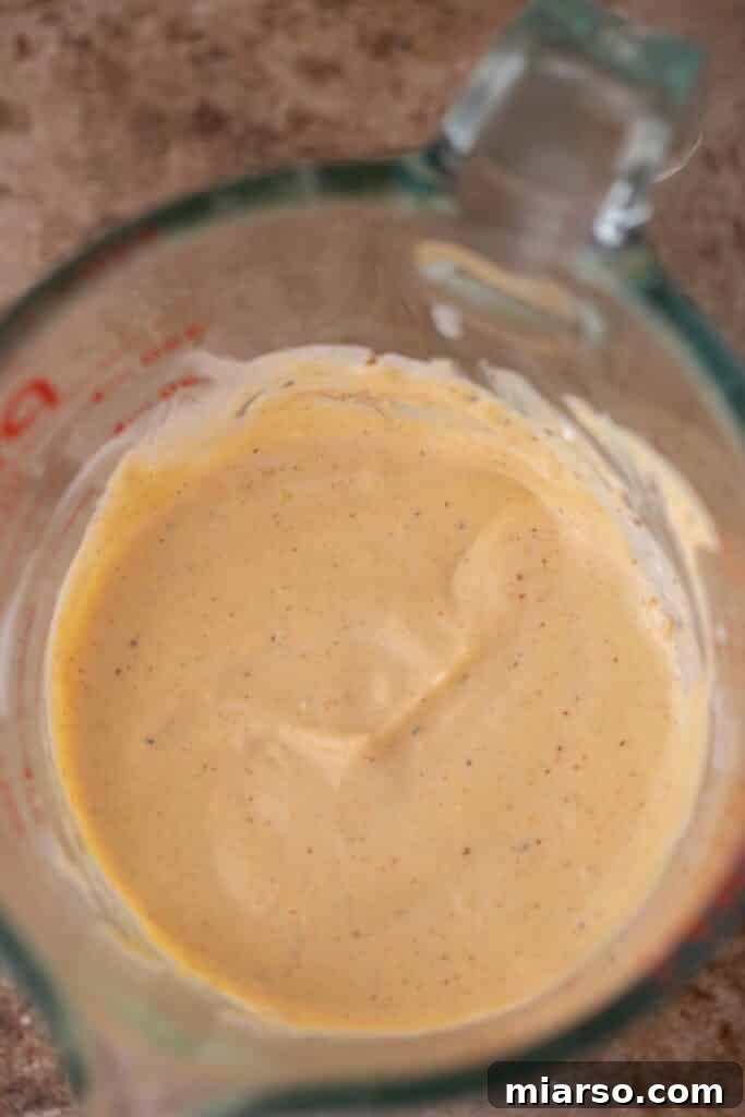 Smooth and creamy blended cottage cheese in a clear cup