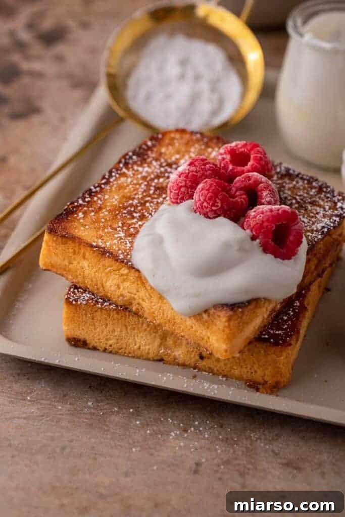Perfect Cinnamon Sugar Toast, Every Time 2 Stack of freshly made cinnamon sugar toast slices, perfectly golden and inviting.
