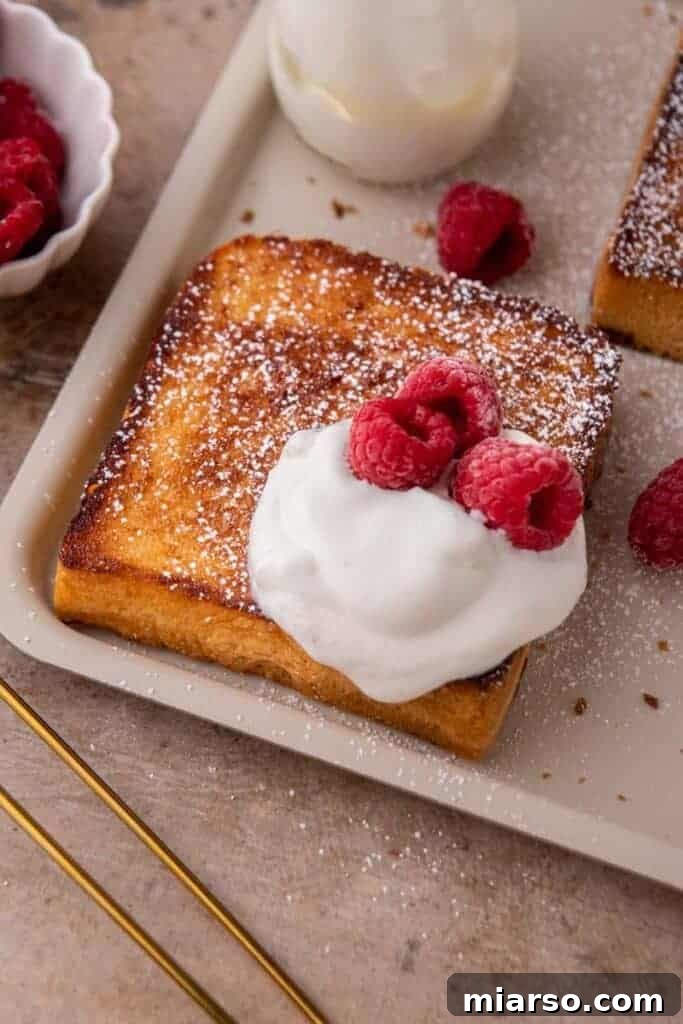 Perfect Cinnamon Sugar Toast, Every Time 11 Overhead shot of freshly prepared cinnamon sugar toast, garnished with a light sprinkle of cinnamon, ready to be enjoyed.