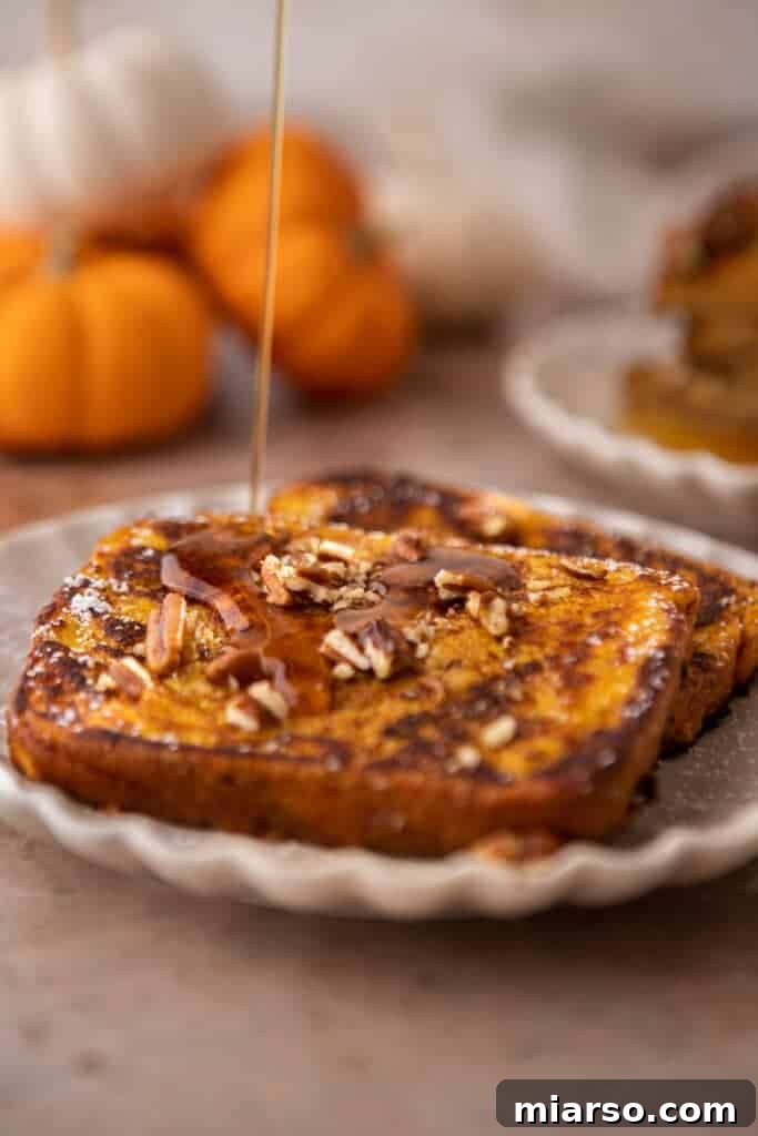 Pumpkin french toast with maple drizzle on top
