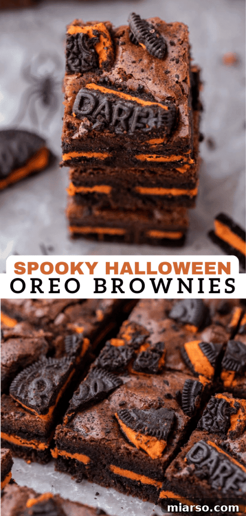 A visually appealing shot of freshly baked Halloween Oreo brownies, highlighting the rich chocolate and contrasting orange of the Oreos.